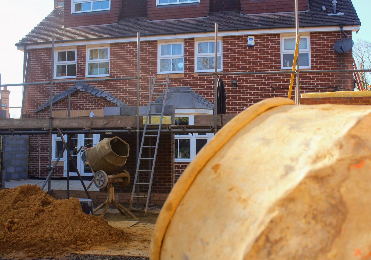 An SG Build extension mid-construction with scaffolding